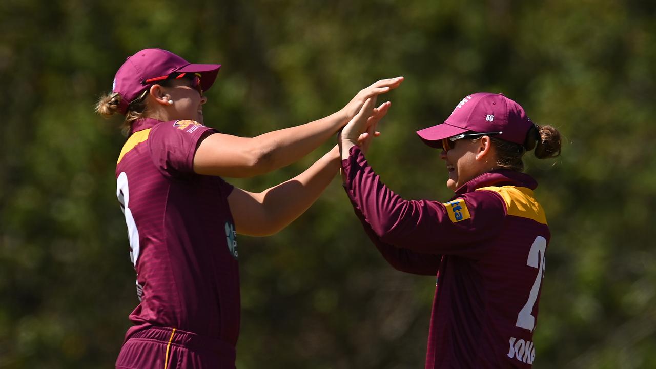 GOLD COAST, AUSTRALIA - OCTOBER 03: Jessica Jonassen of Queensland celebrates catching out Bec Carter of ACT during the WNCL match between Queensland and the Australian Capital Territory at Bill Pippen Oval, on October 03, 2022, in Gold Coast, Australia. (Photo by Albert Perez/Getty Images)