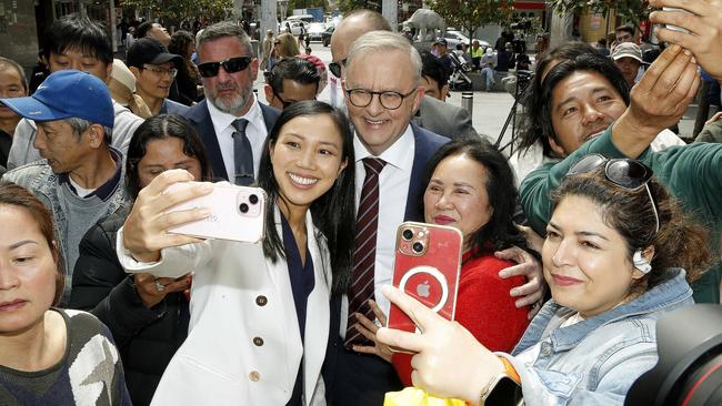 Anthony Albanese campaigns in Cabramatta, Sydney, with the party’s candidate for Fowler, Tu Le, on Friday. Picture: John Appleyard