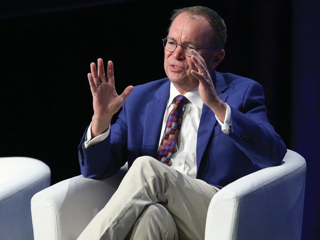 Former White House chief of staff Mick Mulvaney gestures during a discussion with former Australian Ambassador to the US Arthur Sinodinos and The Australian’s editor-in-chief Michelle Gunn at the Universities Australia conference in Canberra on February 25, 2025. Picture: Universities Australia / X