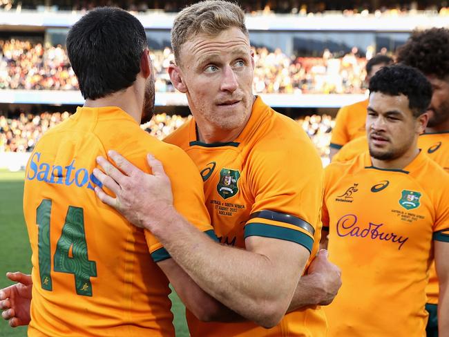 Tom Wright and Reece Hodge embrace after taking down world champion South African in Adelaide. Picture: Cameron Spencer/Getty Images