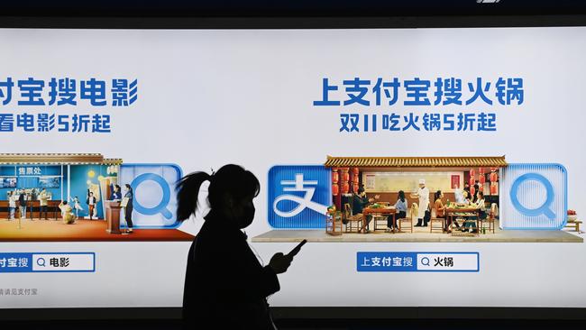 An Alipay advertising billboard in a subway in Beijing. Picture: AFP