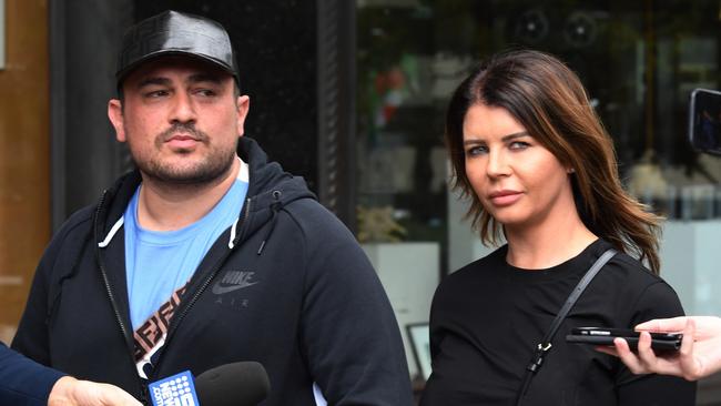 Lone Wolf bikie Erkan Keskin with his wife Kristen outside Downing Centre Local Court in 2018. Picture: AAP