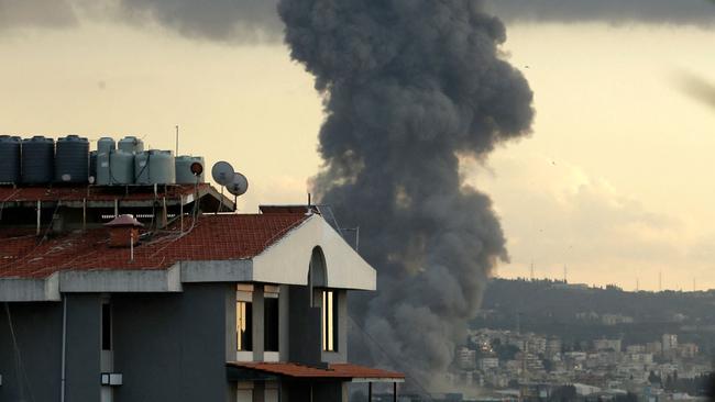 Smoke billows from the site of one of the two Israeli air raids in the southern Lebanese city town of Ghaziyeh. Picture: AFP