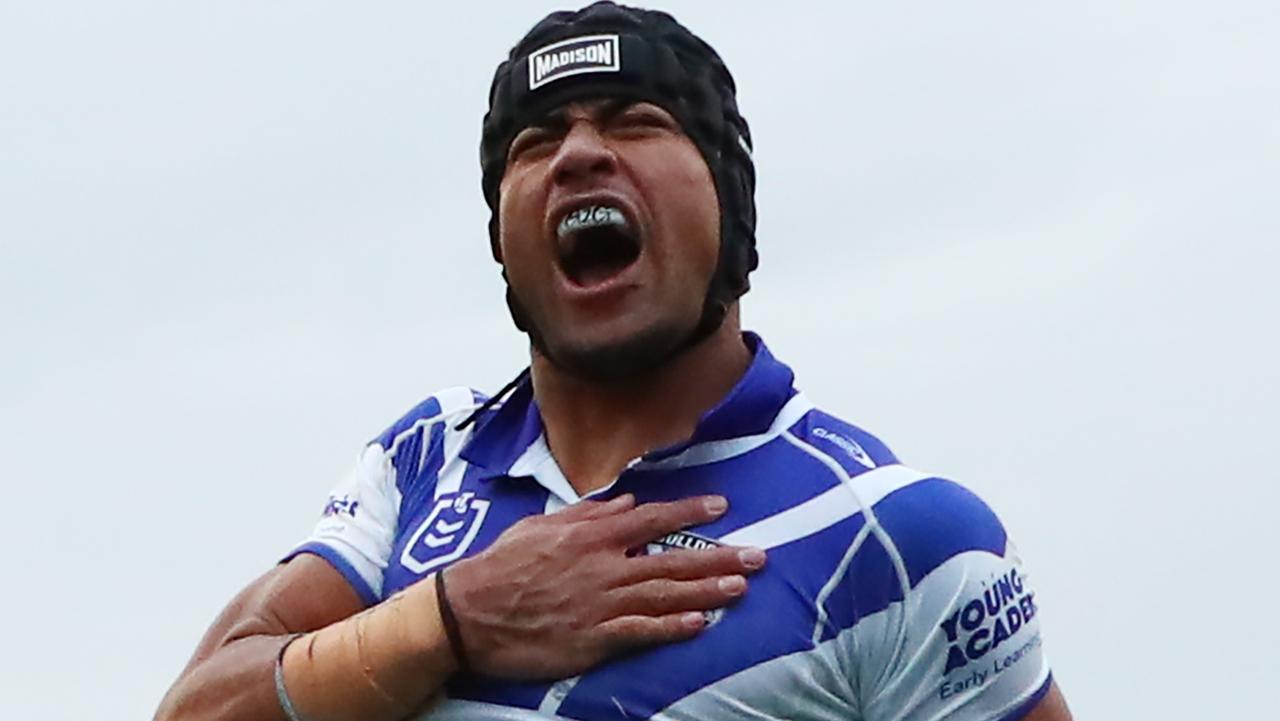 SYDNEY, AUSTRALIA - AUGUST 04: Stephen Crichton of the Bulldogs celebrates scoring a try during the round 22 NRL match between Canterbury Bulldogs and Canberra Raiders at Belmore Sports Ground, on August 04, 2024, in Sydney, Australia. (Photo by Jeremy Ng/Getty Images)