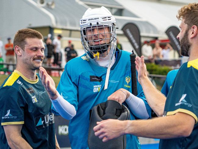 Tassie goalkeeper Magnus McCausland is congratulated after his penalty shootout heroics. Picture: Liam Boric/Liberty Hockey One League