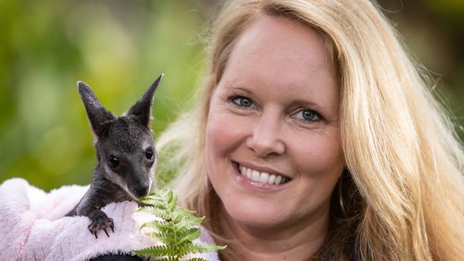 A volunteer with Sydney Wildlife Rescue, Lynleigh Greig, with Tippa the rescued swamp wallaby, has been named in the 2022 Queens Birthday Honours list for service to wildlife conservation — one of 11 northern beaches locals to be recognised for their efforts. (AAP Image / Julian Andrews).