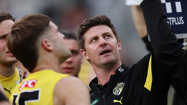 MELBOURNE, AUSTRALIA - MAY 28, 2023 :  AFL Round 11. Richmond vs Port Adelaide at the MCG . Richmond caretaker coach Andrew McQualter at qtr time  .  Pic: Michael Klein