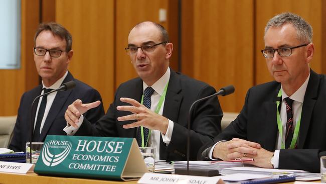 APRA chairman Wayne Byres (centre): ‘A generation of borrowers haven’t experienced material increases in rates.’