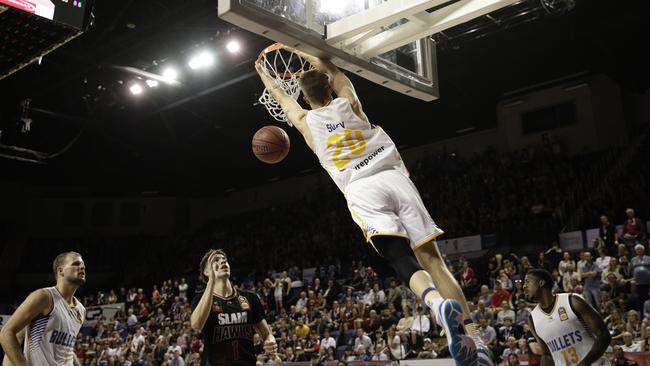 Nathan Sobey of the Bullets dunks during the match between the Illawarra Hawks and the Brisbane Bullets. Picture: Brook Mitchell/Getty Images