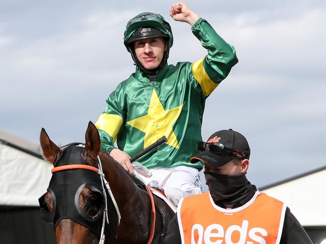 William Pike returns to the mounting yard after his winning ride on Ole Kirk.