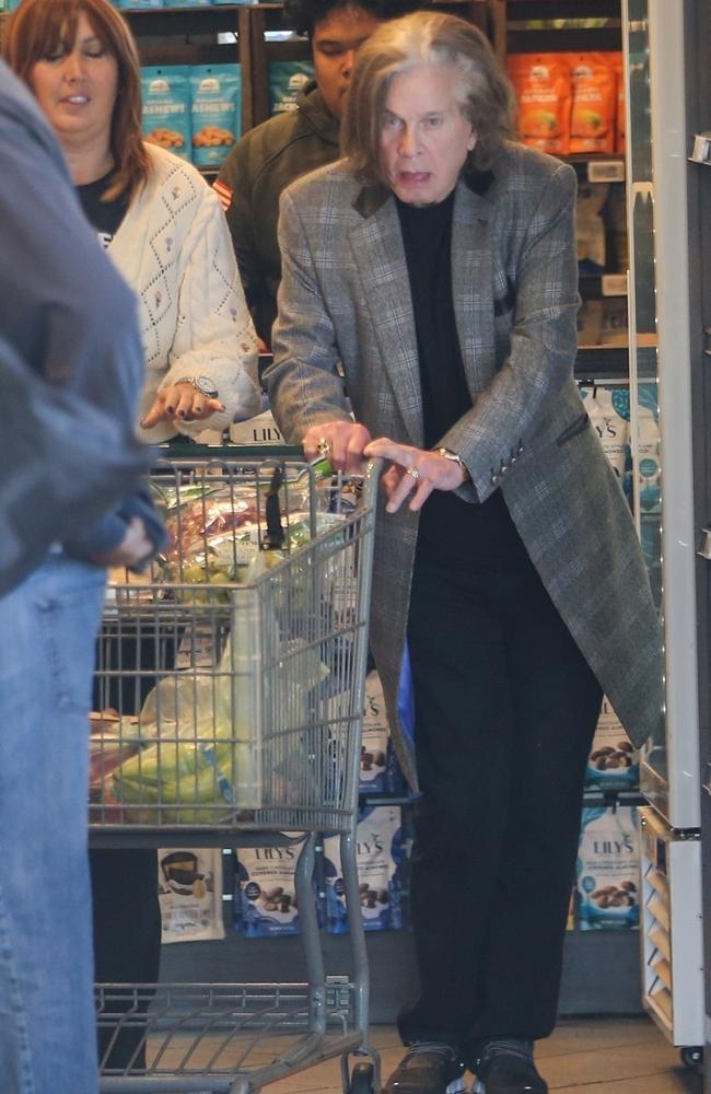 Ozzy was pictured shopping with an assistant. Picture: Backgrid.