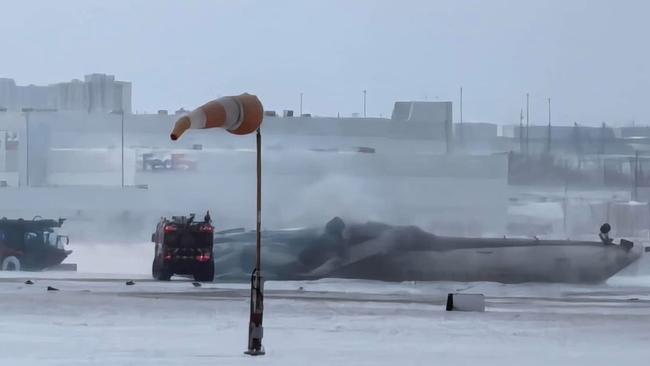 The Delta plane which flipped after landing.