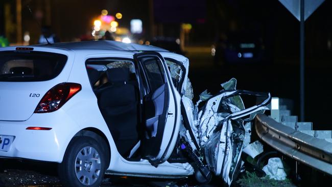 A young female driver is deceased after crashing her Hyundai into a truck on Mamre Road, St Clair. Picture: Bill Hearne