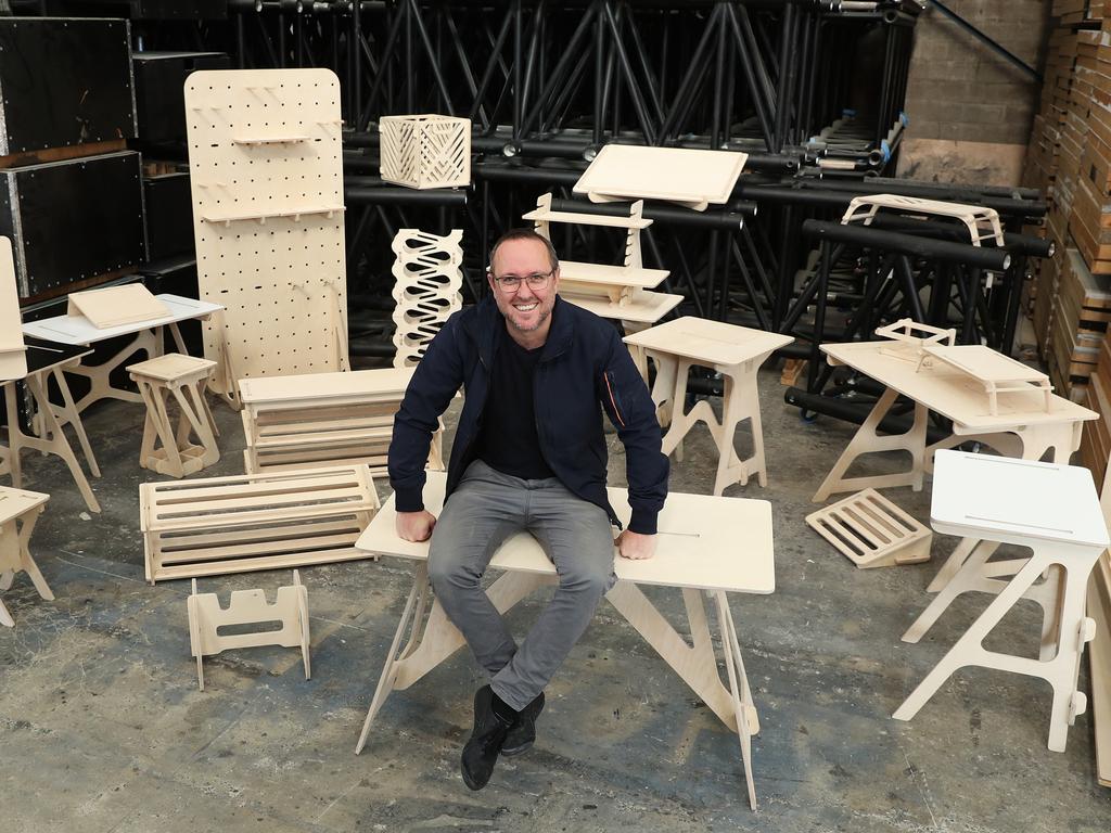 Stagekings head of production Mick Jessop with his home furniture creations. Picture: Brett Costello