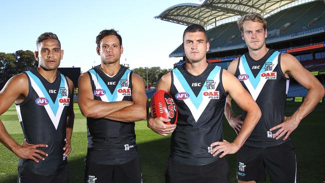 Port Adelaide recruits Dom Barry, Steven Motlop, Tom Rockliff and Jack Watts. Picture: Sarah Reed