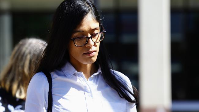 Liz Thomas, the partner of pilot Stuart Weavell, leaves the Cairns Coroner's Court during the inquest into the Lockhart River plane crash that claimed the lives of five people including Mr Weavell. Ms Thomas will make a statement on the final day of the inquest. Picture: Brendan Radke