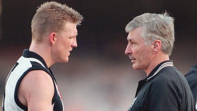 Buckley and Mick Malthouse have words during three-quarter-time of a clash against the Swans in 2000.