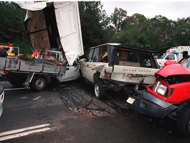 26/07/01   99855Two people were critically injured in this 3 car pile up on the Tewantin-Cooroy Rd and Sivyers Rd intersection at Cooroy yesterday.