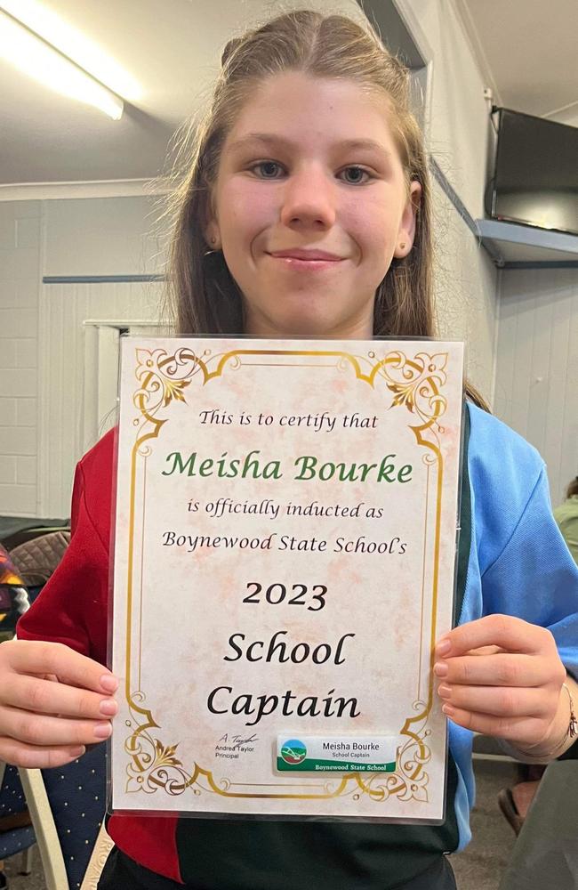 Meisha Bourke holding her 2023 school captain certificate.