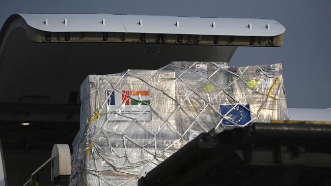 A cargo plane loaded with the COVID-19 coronavirus medical supplies from France, on the tarmac at the Indira Gandhi International Airport in New Delhi. Picture: AFP.