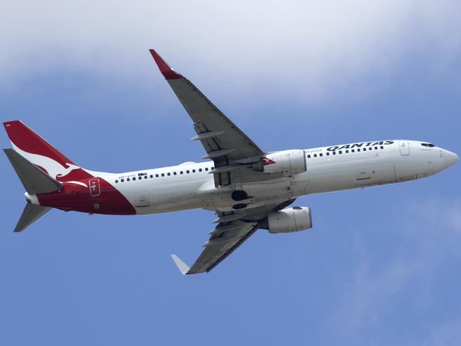 BRISBANE AUSTRALIA - NewsWire Photos SEPTEMBER 6, 2022: A Qantas plane leaves Brisbane Airport. Hundreds of Australians are stranded in Bali after multiple Jetstar flight cancellations leave travellers scrambling to find emergency accommodation. TheyÃre calling on Qantas to help bring them home. NewsWire / Sarah Marshall