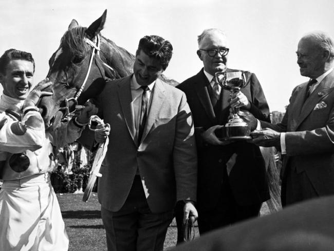 NOT FOR INTERNET... 27/07/2010 NEWS: NOT FOR INTERNET... 27/07/2010 NEWS: 1965 Melbourne Cup. Light Fingers wins. Roy Higgins. Bart Cummings. HWT archival negative. F9875270 F9875270