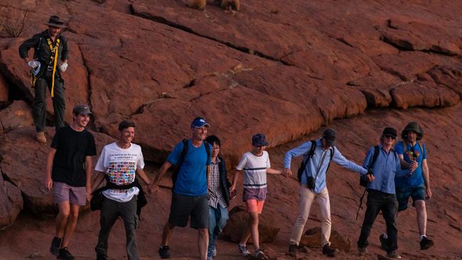 The final climbers on Uluru, in October 2019. Picture: Emma Murray