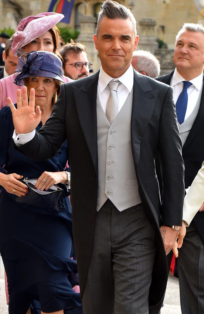 Robbie Williams arrives ahead of the wedding of Princess Eugenie of York and Mr. Jack Brooksbank at St. George’s Chapel on October 12, 2018 in Windsor, England. (Photo by Matt Crossick - WPA Pool/Getty Images)