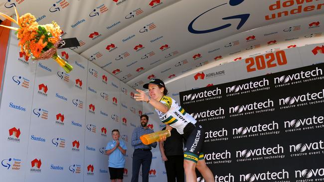 Amanda Spratt tosses some flowers in celebration of her Stage 2 victory. Picture: Tim de Waele/Getty Images