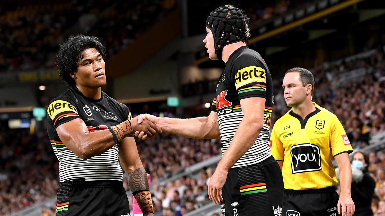 Brian To’o and Matt Burton shake hands to celebrate Burton’s try. (Photo by Bradley Kanaris/Getty Images)