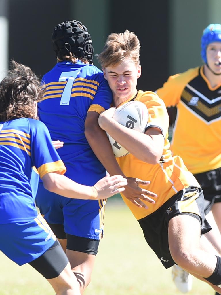 Boys Rugby League State Championship held at Northern Division, Brothers Leagues ground, Townsville. 14-15 years. Capricornia (gold) v South West (blue). Marcus Tipman of Nth Rockhampton SHS.