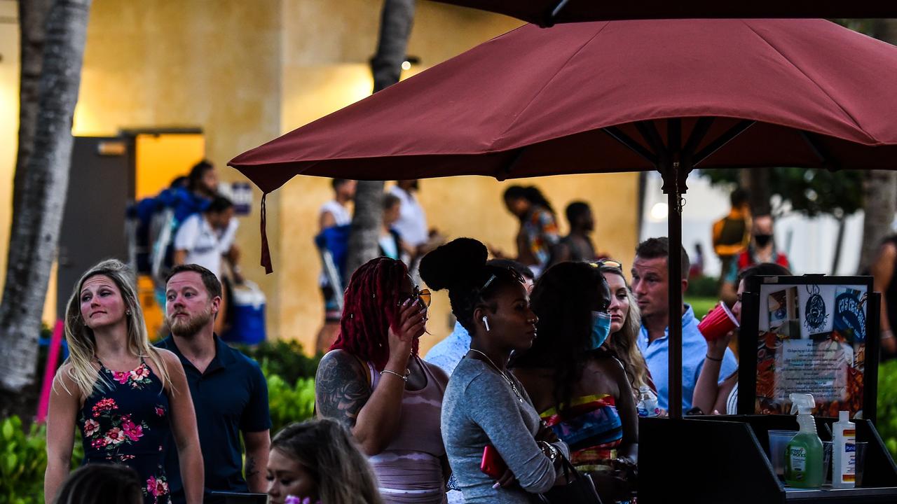 Crowds continue to flock to clubs and bars in Miami Beach despite raising case numbers in Florida. Picture: CHANDAN KHANNA / AFP.