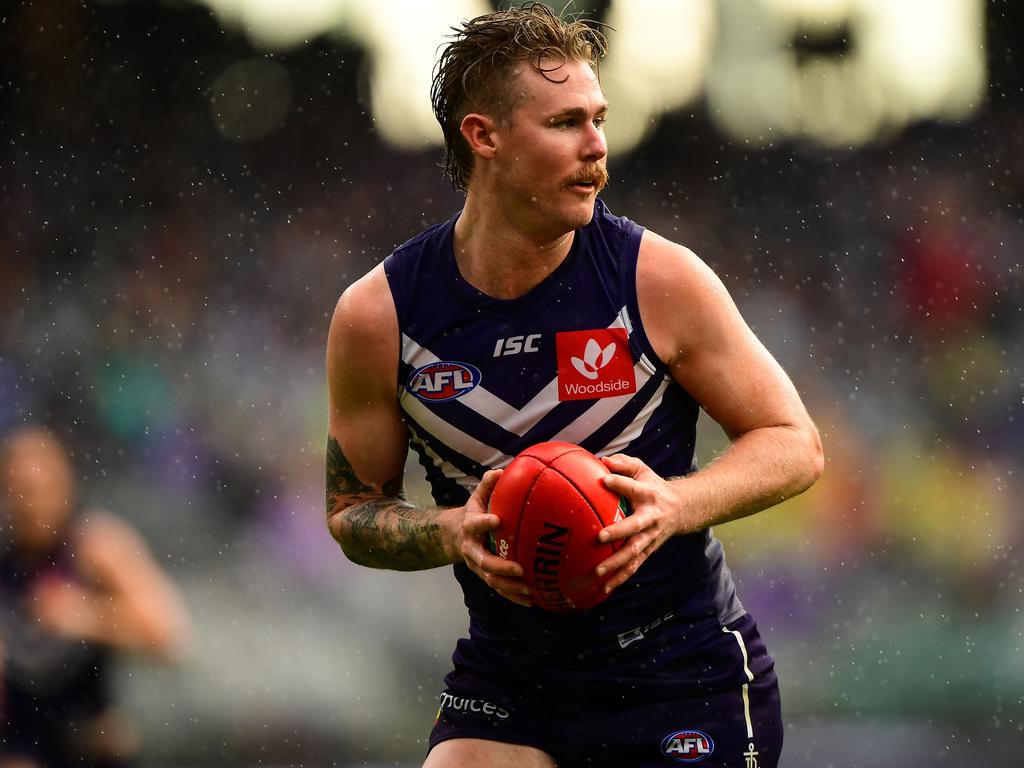 PERTH, AUSTRALIA - MAY 27: Cam McCarthy of the Dockers in action during the 2018 AFL round 10 match between the Fremantle Dockers and the North Melbourne Kangaroos at Optus Stadium on May 27, 2018 in Perth, Australia. (Photo by Daniel Carson/AFL Media/Getty Images)