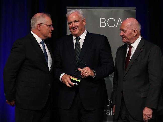 WINNER MD Pat Creaghan accepting Big Impact Award on behalf of ATCO at the Business Council of Australia (BCA) 2021 Biggies Award (L-R) Prime Minister Scott Morrison, MD Pat Creaghan and Sir Peter Cosgrove.Jane Dempster/The Australian.