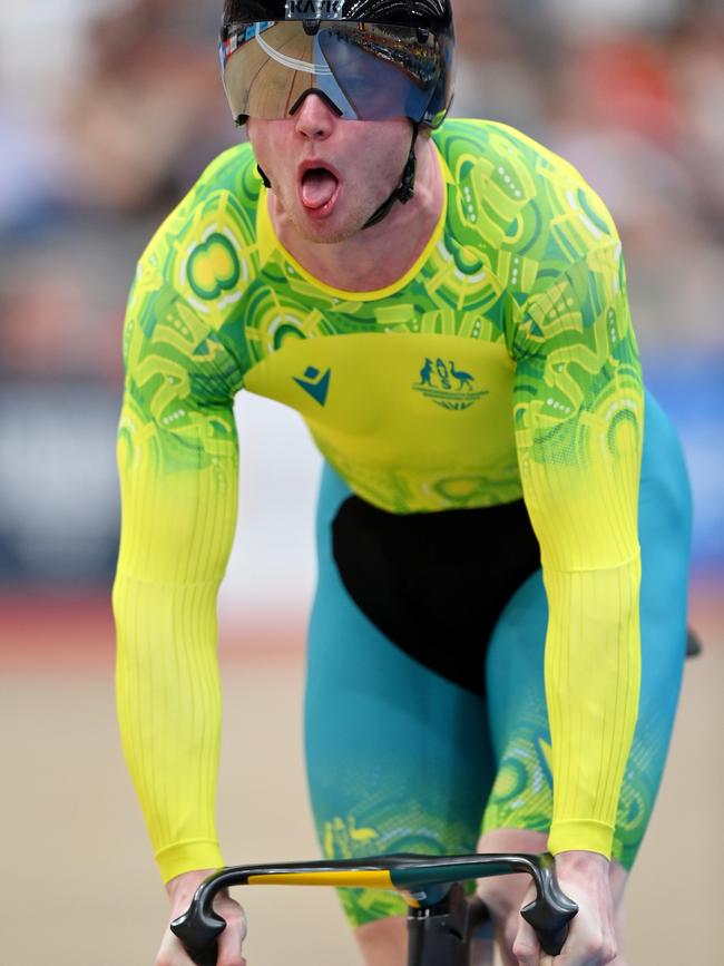 Tom Cornish takes a hold of his handlebars.