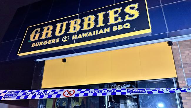 Police at the scene of an arson attack overnight at Grubbies Burgers &amp; Hawaiian BBQ at Redbank Plains.