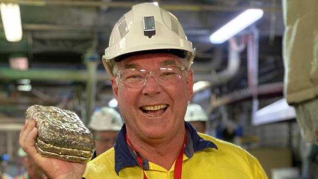 Queensland Mines Minister Scott Stewart with a gold bar poured at Minjar Gold's Pajingo mine, south of Charters Towers. Picture: Trudy Brown