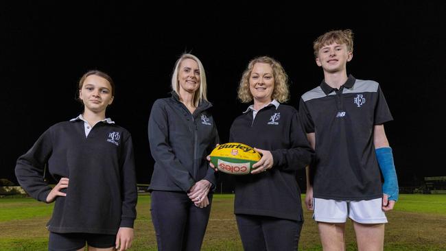 Port District volunteers Sophie Rowe and Rachael Kay with juniors Macie Rowe and Connor Day at Largs Bay. Picture: Ben Clark