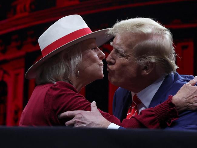 DALLAS, TEXAS - MAY 18: Former U.S. President Donald Trump greets Debbie Douglas as speaks during the NRA ILA Leadership Forum at the National Rifle Association (NRA) Annual Meeting & Exhibits at the Kay Bailey Hutchison Convention Center on May 18, 2024 in Dallas, Texas. The National Rifle Association's annual meeting and exhibit runs through Sunday.   Justin Sullivan/Getty Images/AFP (Photo by JUSTIN SULLIVAN / GETTY IMAGES NORTH AMERICA / Getty Images via AFP)