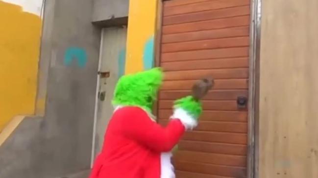 The Grinch busting down a door. Picture: Peru National Police