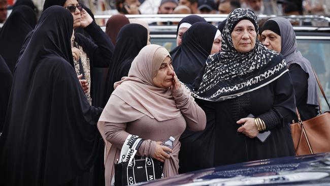 Grieving... Mourners at Lakemba Mosque. Picture: Sam Ruttyn