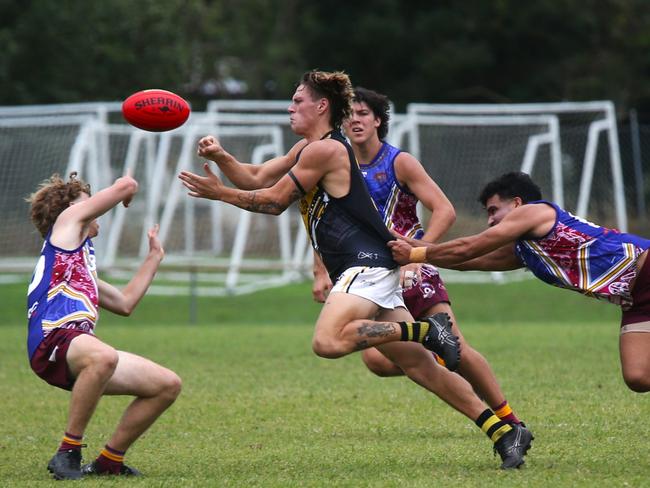 Pictured: Tigers defender Cooper Cartledge. Cairns City Lions v North Cairns Tigers at Holloways Beach. Dreamtime by the Sea. AFL Cairns 2024. Photo: Gyan-Reece Rocha