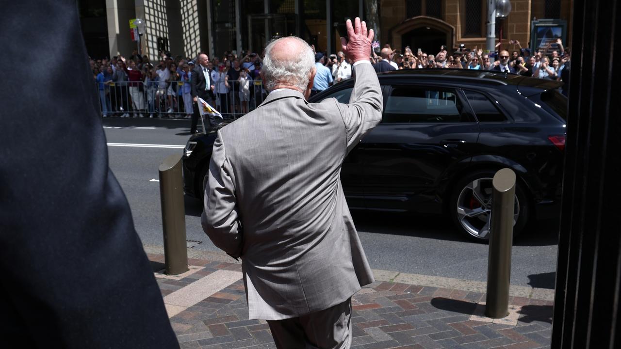 King Charles III waves to people waiting to see him in Sydney on October 20, 2024. Photo: David Gray – Pool/Getty Images