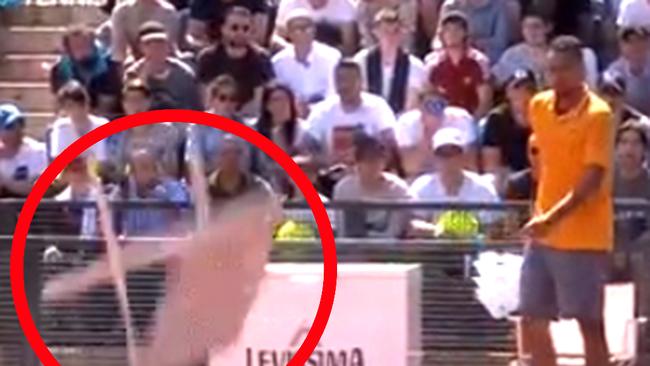 Nick Kyrgios throws a chair (circled) onto the court during his Italian Open meltdown.