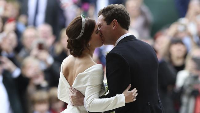 Princess Eugenie of York and Jack Brooksbank kiss after their wedding. Picture: AP