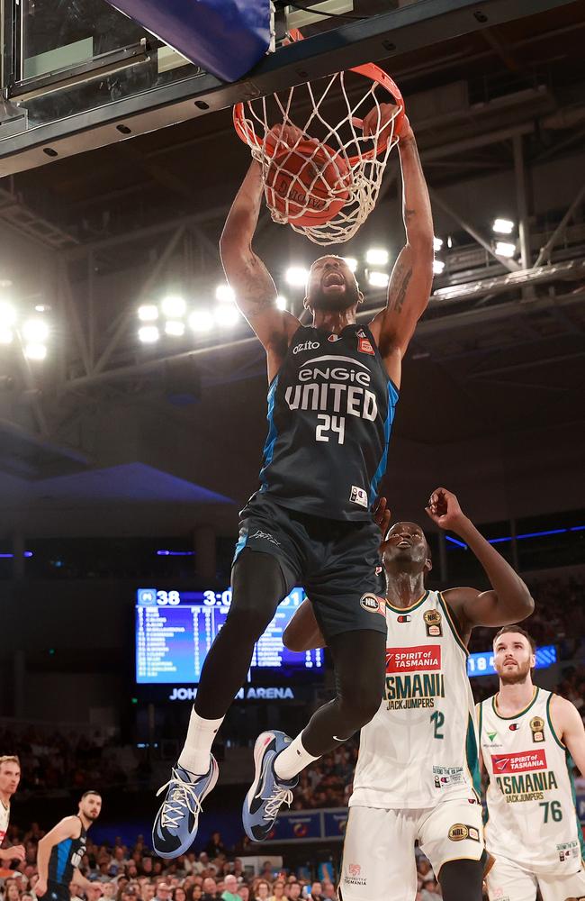 Marcus Lee of United dunks during his side’s loss on Monday night. Picture: Kelly Defina/Getty Images.