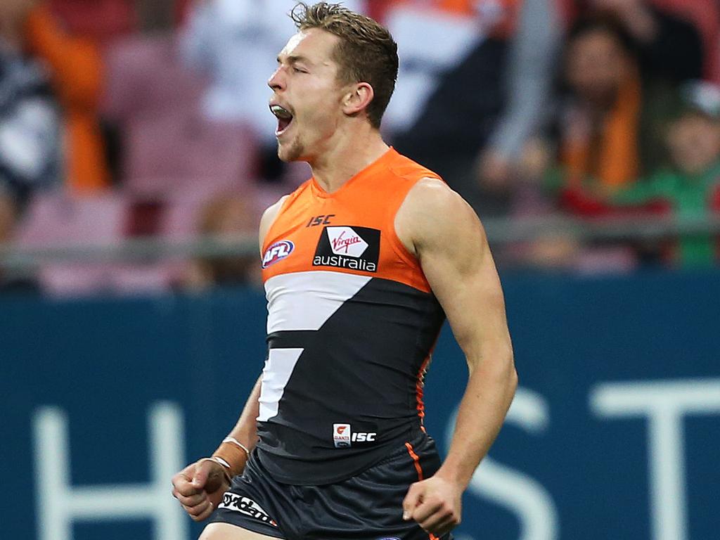 Greater Western Sydney's Devon Smith celebrates a goal during AFL match GWS Gianst v Collingwood at Spotless Stadium. pic. Phil Hillyard