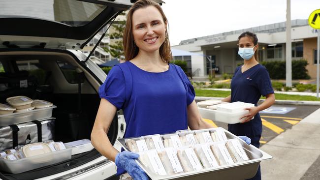 Joeline Hackman, the community backed independent candidate in Manly at the next state election, was a co-founder of Feed Our Medics. Ms Jackman is pictured in April 2020 at Mona Vale Hopsital delivering food to frontline health workers. Picture: Sam Ruttyn