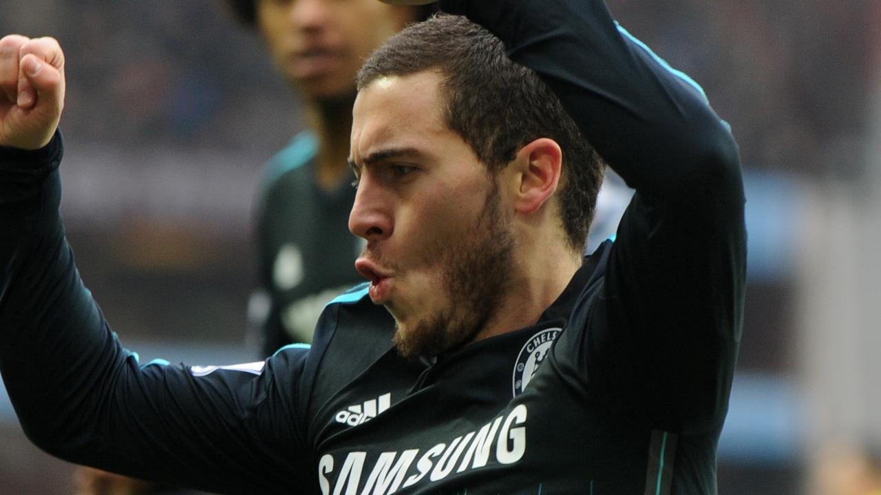 Chelsea's Eden Hazard celebrates after scoring against Villa during the English Premier League soccer match between Aston Villa and Chelsea at Villa Park, Birmingham, England, Saturday, Feb 7, 2015. (AP Photo/Rui Vieira)