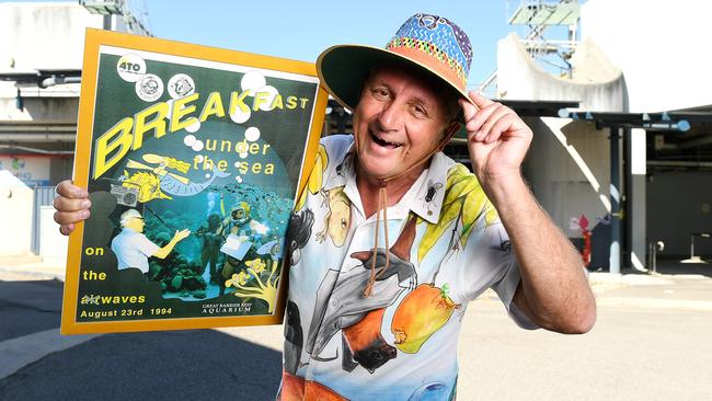 Steve Price outside the closed Reef HQ, with a promotion of a radio show he did in 1994 at the aquarium. Picture: Shae Beplate.